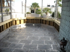 Metal tiled floor on second floor porch.