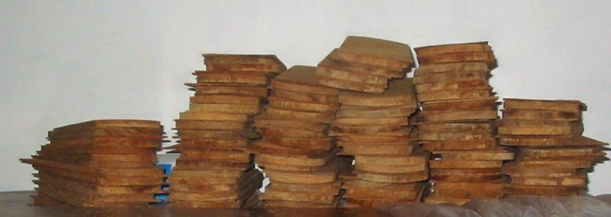 Bundle of new fishscale shingles. Bundle of new fishscale shingles.